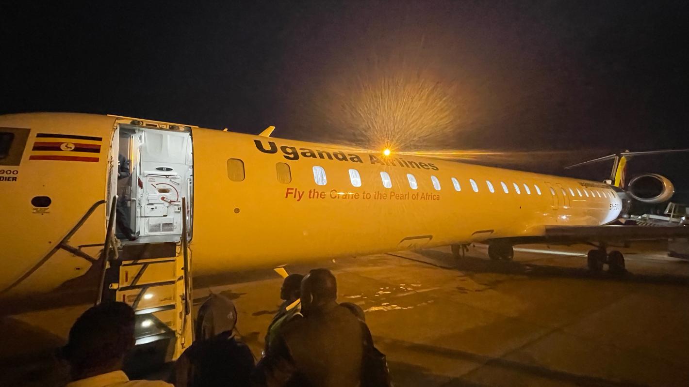 A photo of the UDHAN team boarding its flight to Mogadishu