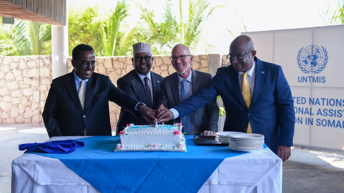 UN Special Representative James Swan with Somali ministers cutting a cake at the official launch of UNTMIS A photo of UN Special Representative James Swan with Somali ministers cutting a cake at the official launch of UNTMIS