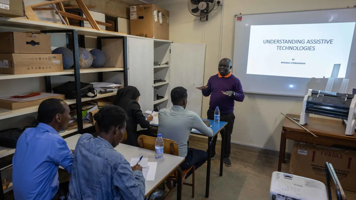 A photo of participants attend a training on braille production and digital inclusion at KyU Hi-Techn Center in Kampala, Uganda. A photo of participants attend a training on braille production and digital inclusion at KyU Hi-Techn Center in Kampala, Uganda.