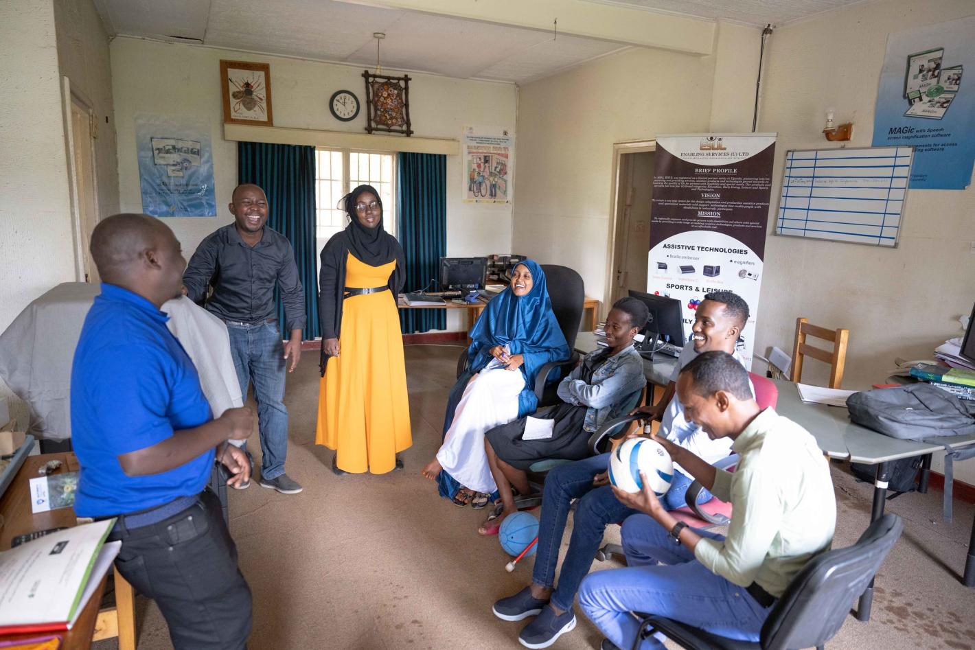 Photo of the UDHAN team interacts with representatives from a local civil society group.