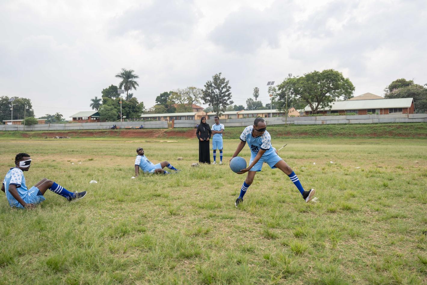 A photo of the members of UDHAN goalball team during a friendly match organized by the KyU Faculty of Special Needs as part of a week-long training in Kampala, Uganda.