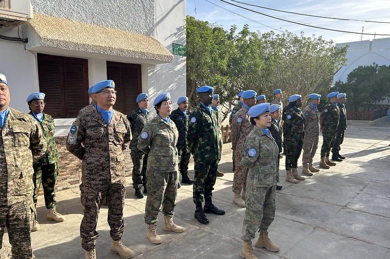 This image links to MINURSO'S Flickr account Group of UN Military staff standing in formation