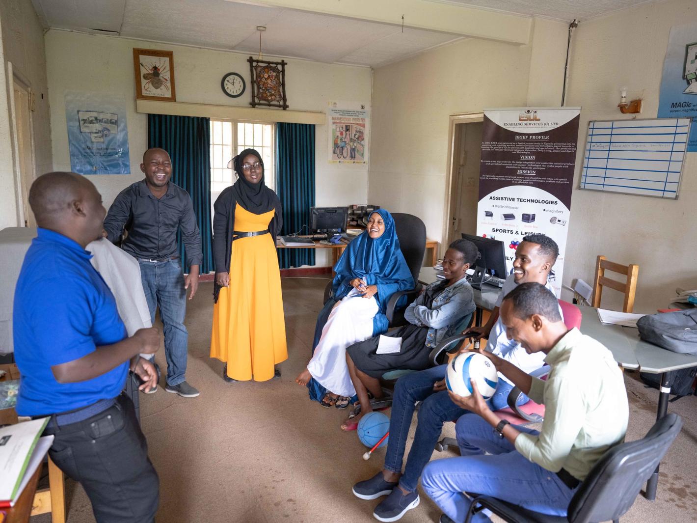 Photo of the UDHAN team interacts with representatives from a local civil society group.