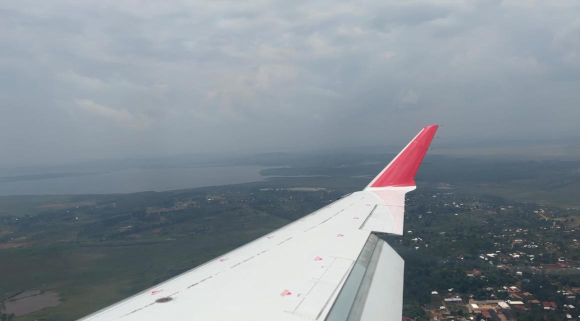 A photo of landcape of Kampala, Uganda through a aircraft window