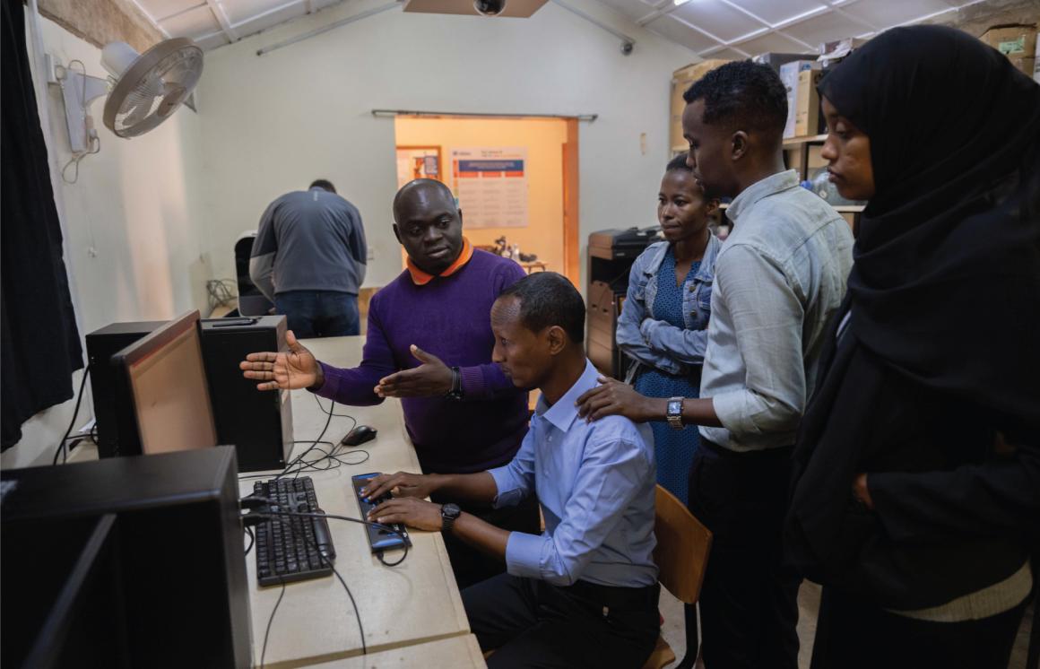 A photo of participants during a training on braille production and digital inclusion at KyU Hi-Techn Center in Kampala, Uganda.