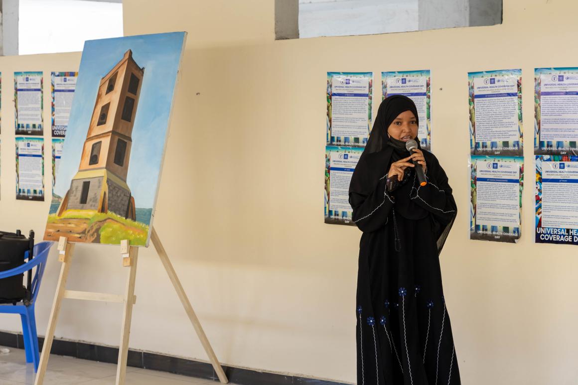 Af-baraawe (Chimwini) speaker, Safia Jaylaani, speaks at an event to mark International Universal Health Coverage Day at the National Museum in Mogadishu, Somalia, on 18 December 2024.   